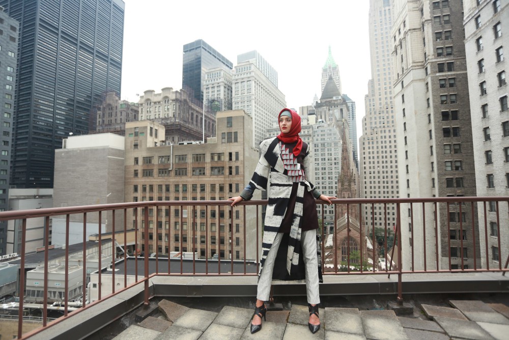 Dian Pelangi (Indonesian, b. 1991) for New York Fashion Week, 2017, Ensemble: Cap, Headscarf, Top, Jacket, Skirt and Pants, 2017, Thai silk, batik Thai silk with songket (supplementary-weft patterning), striped silk (Tenun Salur), wood beaded appliqué. Courtesy of the artist. Image courtesy of the Fine Arts Museums of San Francisco